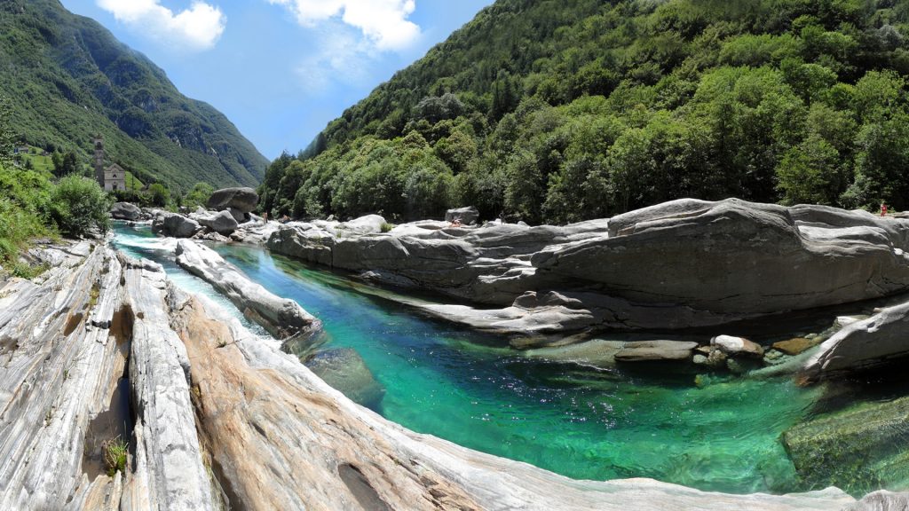 Verzasca River emerald water flowing through rocks