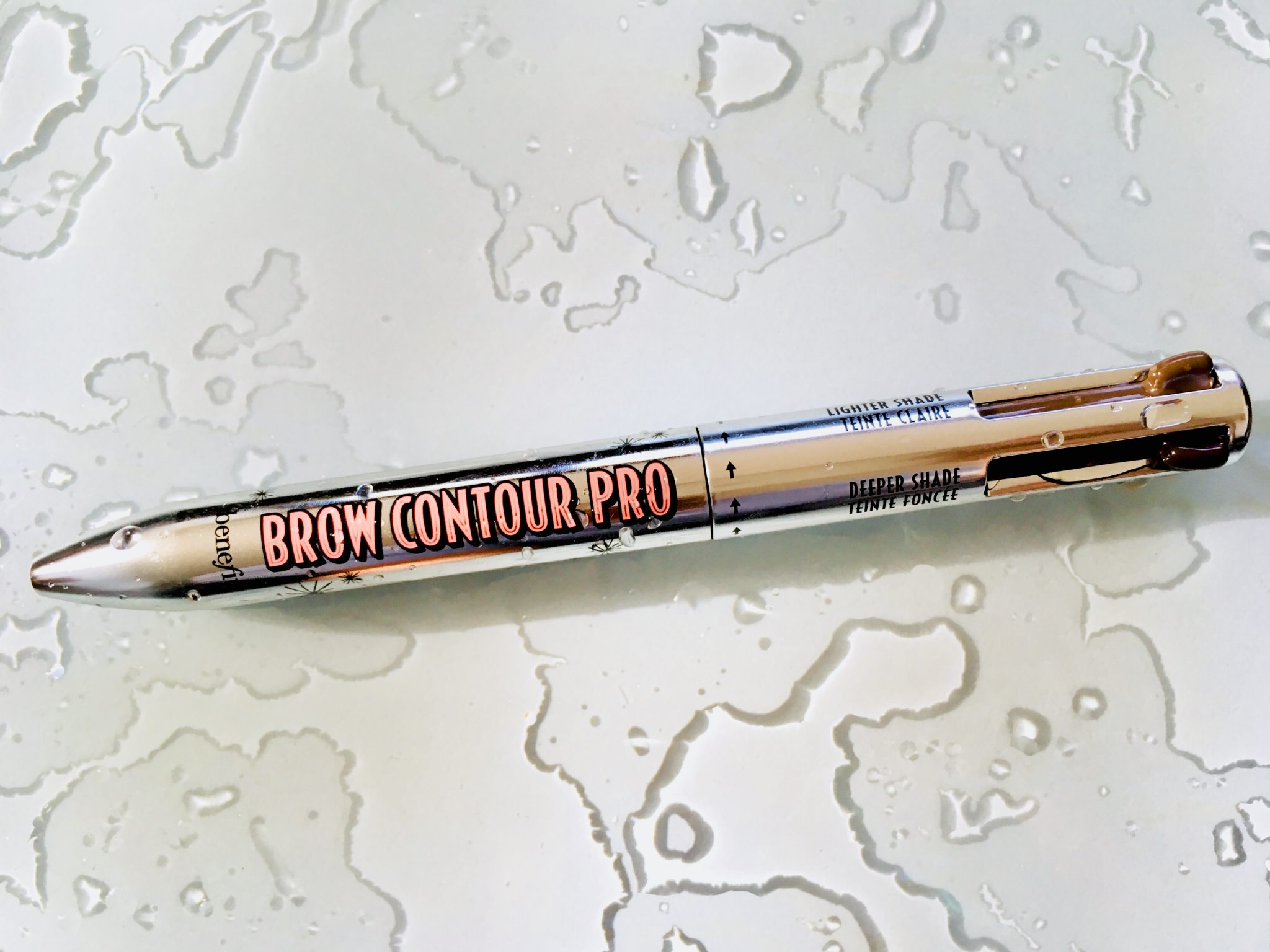 benefit cosmetics brow contour pro pencil surrounded by water