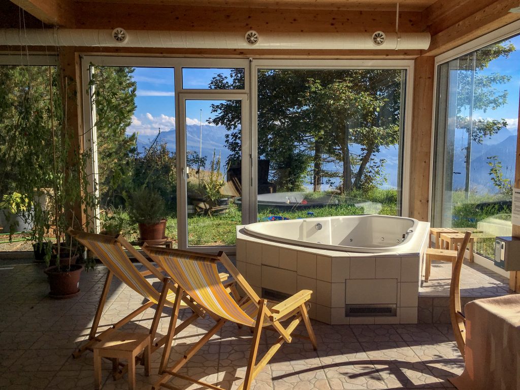 whirlpool jacuzzi overlooking the swiss alps 