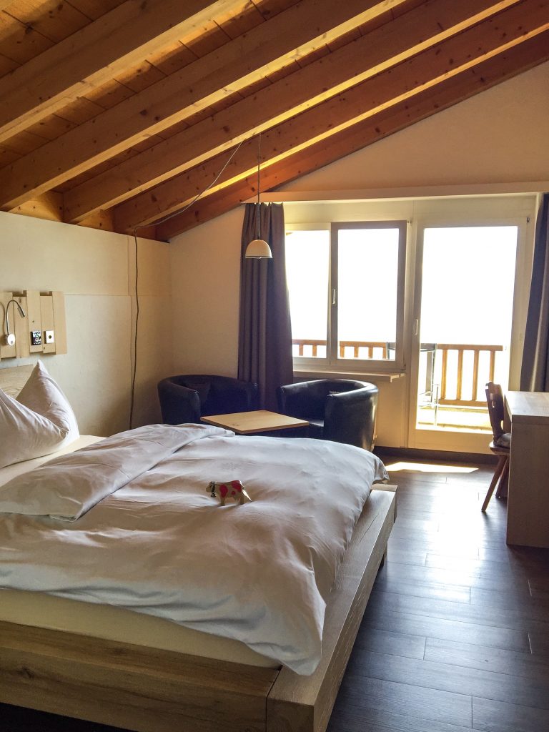 Inside the Double Bedroom with Balcony at Kräuter Hotel Edelweiss