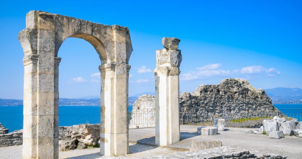archway and pillar ruins of the grotto of castallus overlooking lake garda