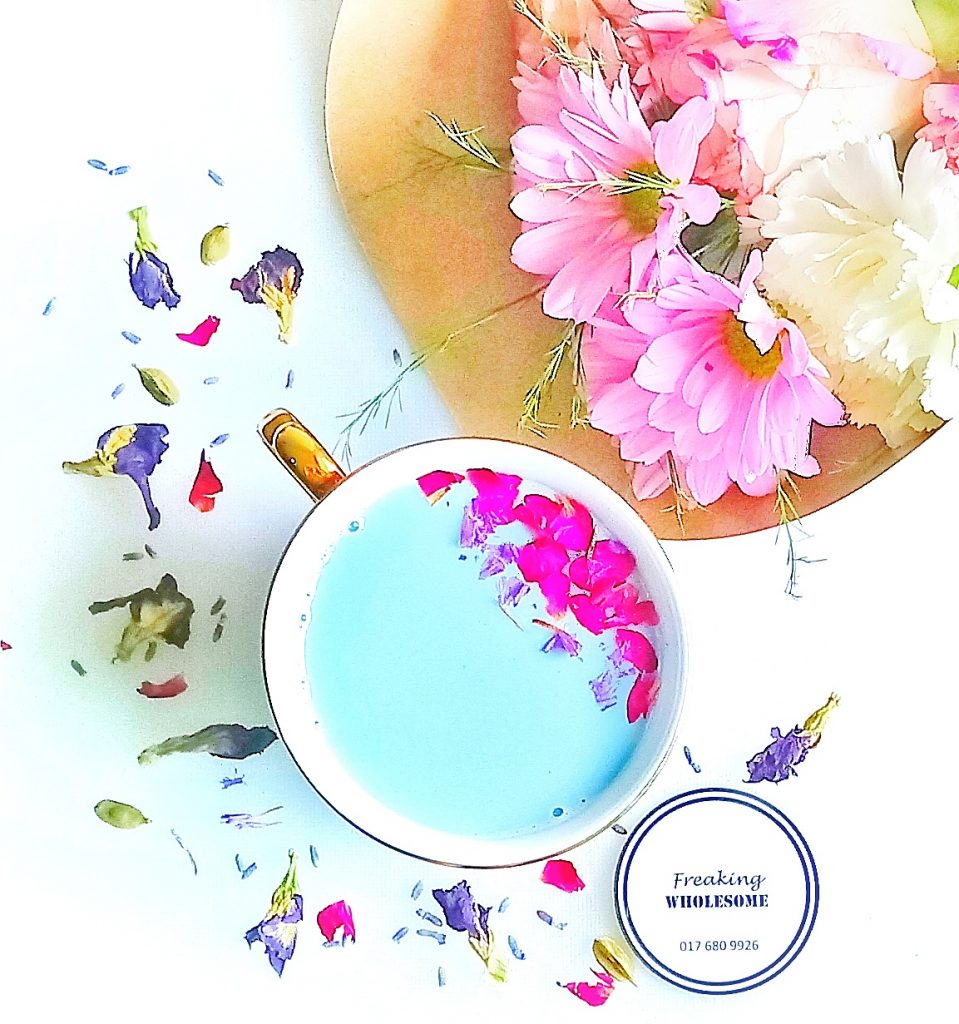 pretty cup of blue tea with butterfly pea flowers and dried lavender