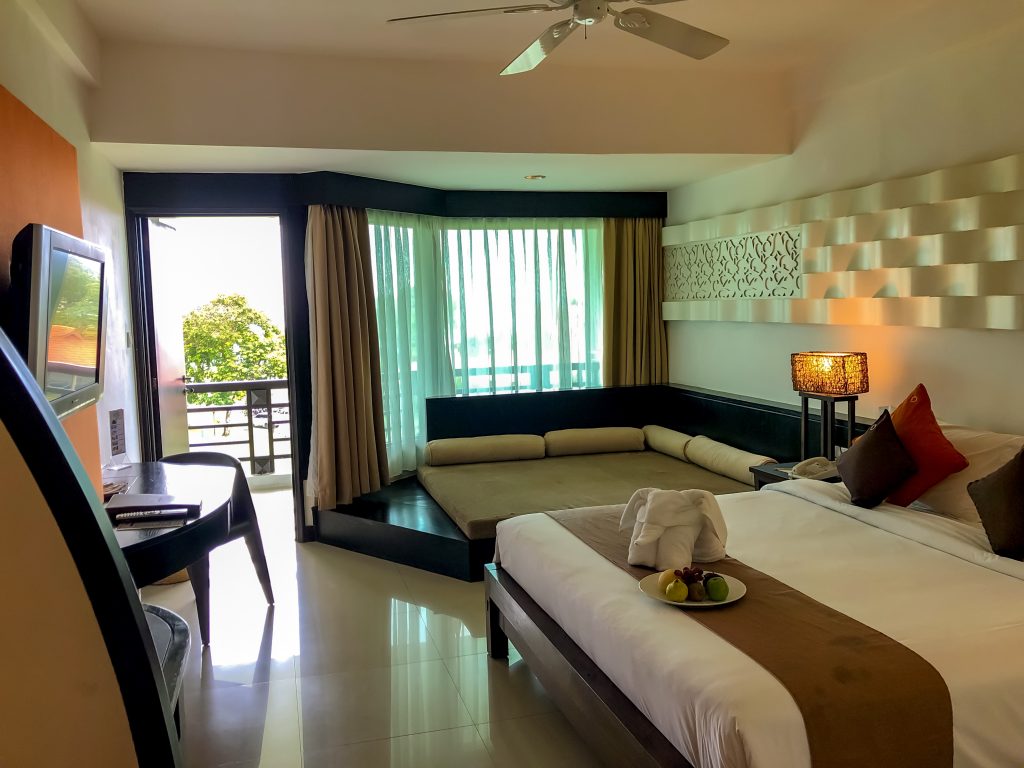 interior of deluxe sea facing room with king size bed in bintan lagoon resort