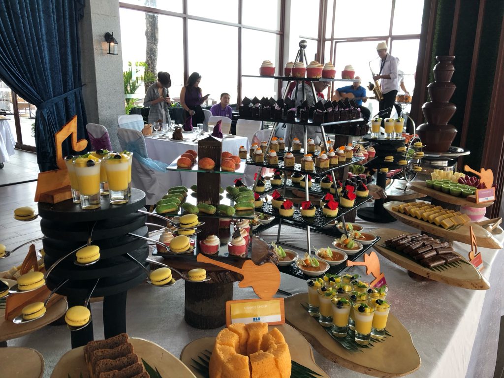Decadent buffet table spread with chocolate fountain at Nelayan Jazz Brunch