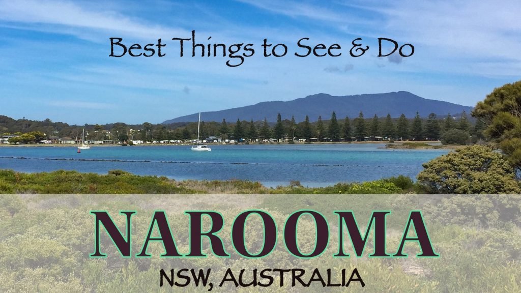 what to do in Narooma, NSW Australia, boats sailing on blue waters with Mt Gulaga in the background