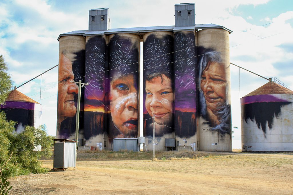 art mural painting of people on silos in victoria