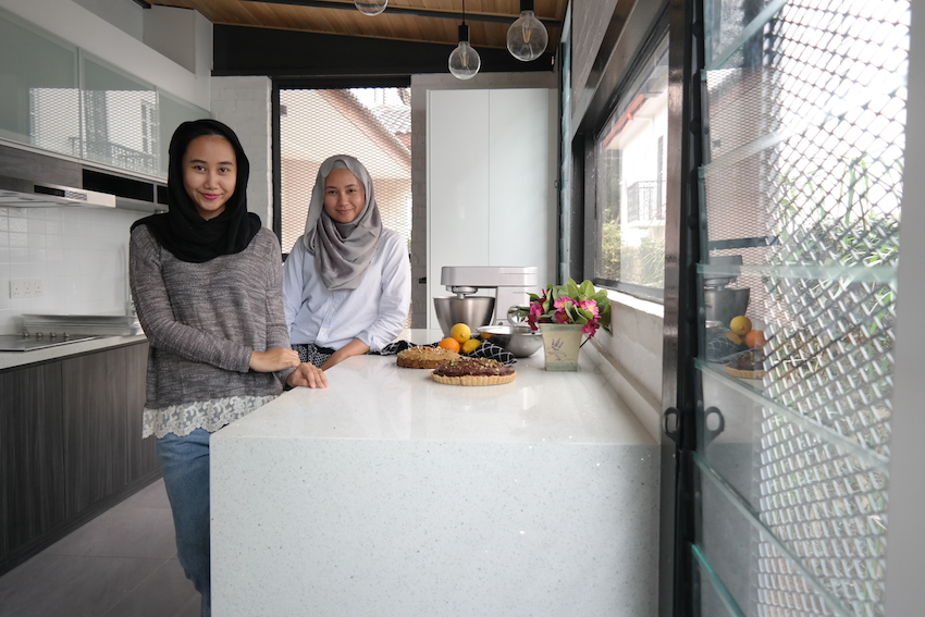 baked kl founders sisters izi and iza in their kitchen