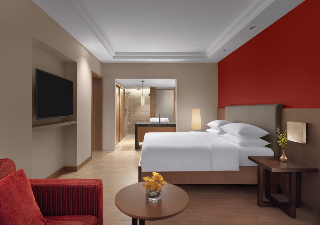 hyatt kuantan family bedroom king bed red wall
