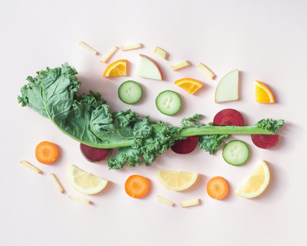 array of vegetables and fruits flatlay cold pressed juices malaysia