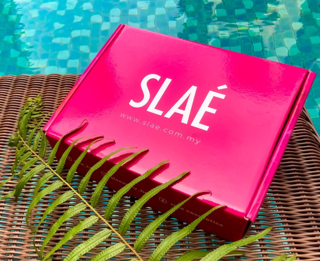 fushcia bright pink cosmetics makeup giftbox by the pool