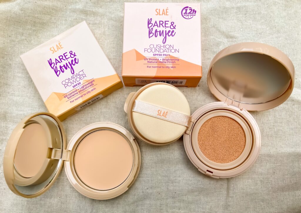 must have makeup sets for summer cushion and powder foundation open boxes on plain background 