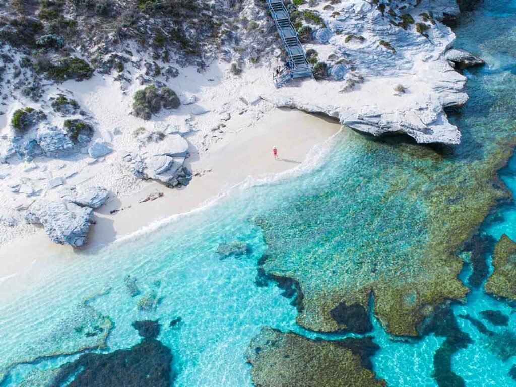 aerial view of rottnest island beach azure waters white sand and corals